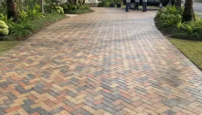 Completed interlocking paver driveway installation by landscaping experts in New Orleans, LA